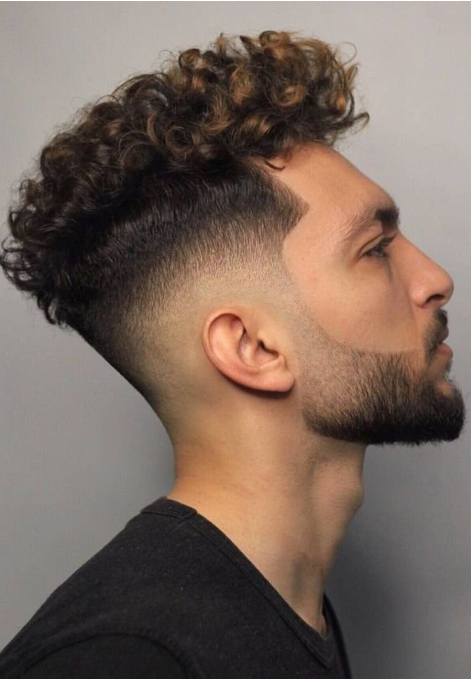 Hair Styles for Men Low Fade That Look Clean and Modern 31 https://vikingbeardbrand.ca/cdn/shop/articles/low-fade-haircut-for-men_952x.jpg?v=1727912482